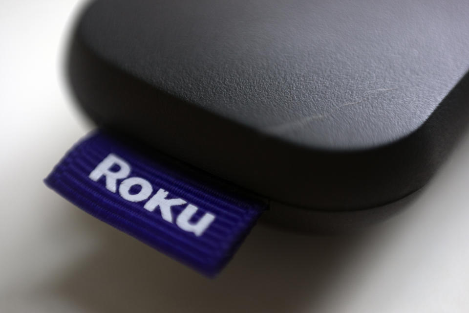 FILE - This Aug. 13, 2020 file photo shows a logo for Roku on a remote control in Portland, Ore. Roku is cutting about 10% of its employees, or 360 people, as the streaming company looks to lower expenses. Roku Inc. said in a regulatory filing, Wednesday, Sept. 6, 2023, that it anticipates a restructuring charge of $45 million to $65 million related to the job cuts (AP Photo/Jenny Kane)